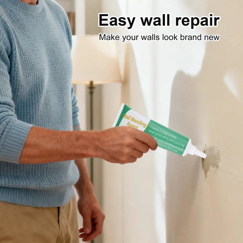Person using All In One Drywall Repair Kit For Holes And Cracks With Mending Agent Scraper Sandpaper And Nozzle Extender on wall.