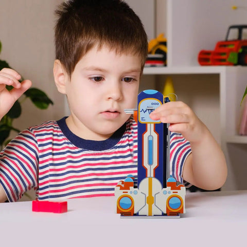 Hands On DIY STEM Elevator Project For Kids Age Five Plus A Fun Engineering Puzzle Kit With Step By Step Guide To Build A 3D Elevator Model Learn Physics And Critical Thinking Through Creative Play. Child assembling KT board STEM elevator model