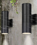 Dusk To Dawn Outdoor Wall Light With Up And Down Lighting, LED A19 Bulbs Included, Matte Black Sconce on wet wall
