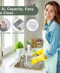 Woman cleaning 1.5L 304 stainless steel container from Hot On The Go Electric Lunch Box For Adults in kitchen sink.
