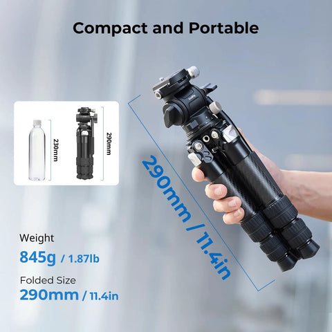 Hand holding Pro Grade Carbon Fiber Tabletop Tripod Kit With 17 Inch Compact Desktop Design, folded size 290mm, next to bottle.