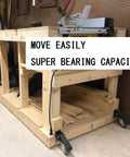 Heavy Duty Workbench Caster Kit Set Of Four Featuring Retractable Step Down Wheels Built Like A Tank To Handle 300 Kilogram Weight on a wooden workbench.