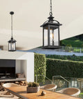 Outdoor Pendant Light Lanterns Two Pack White Aluminum With Seeded Glass hanging over patio table and chairs