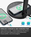LED Desk Lamp With Wireless Charger And USB Port, 5 Color Modes And 5 Brightness Levels, charging phone on lamp base.