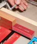 Pro Grade Setup Blocks Height Gauge Set For Router And Table Saw Seventeen Piece Aluminum Height Master in use on table saw.