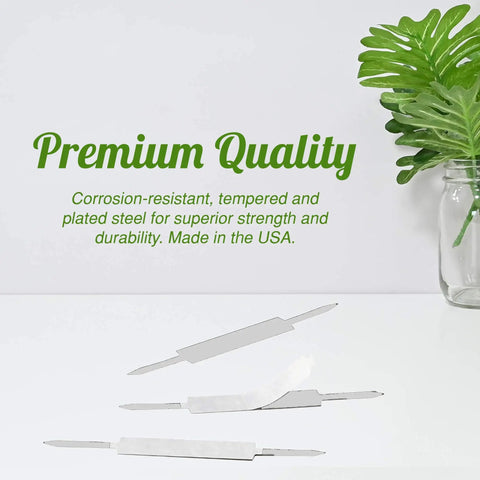 Hella Solid Self Adhesive Prong Fastener Bases Two Inch Capacity Heavy Duty Steel File Clip Holders arranged on a table.