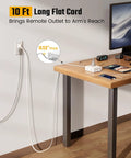 Game Changer Ten Foot Extension Cord With Flat Plug Surge Protector showcasing 10 ft long flat cord extending from a wall outlet.