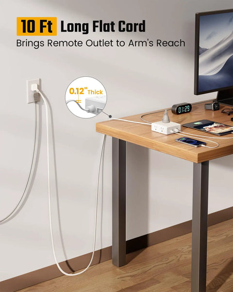 Game Changer Ten Foot Extension Cord With Flat Plug Surge Protector showcasing 10 ft long flat cord extending from a wall outlet.