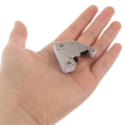 Stainless Steel Roller Catch For Wardrobe And Kitchen Cabinets, Press To Open Door Latch With Collision Protection on a hand for scale