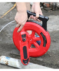 Bullseye Accuracy Heavy Duty Stud Finder And Wall Scanner For Metal Pipes PVC Plumbing Blockages with red handheld device and measuring reel.