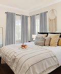 Light Grey 100 Percent Blackout Curtains, 2 Panels Set, 72 Inches Long by 52 Inches Wide Per Panel, in bedroom setting.