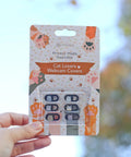 Slick Little Webcam Cover Slide For Laptops And Macbooks Featuring Adorable Cat Vibes privacy covers in packaging.