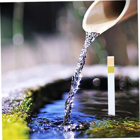 Soil Test Kit With 100 Strips For pH 4.5–9, Easy To Use Test Paper in water, showing quick readouts for lawns and garden testing.