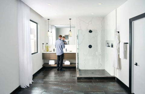 Modern bathroom with Align Matte Black 9 Inch Modern Hand Towel Bar For Bath Or Kitchen against a white wall near glass shower.