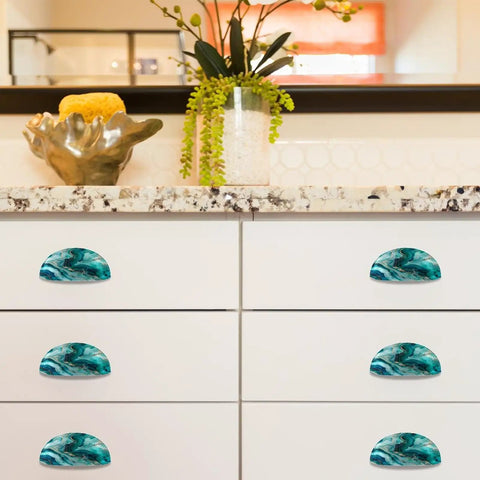 Premium Teal Marble Cabinet Cup Pulls Boasting A Killer Stone Finish on white kitchen drawers with granite countertop.
