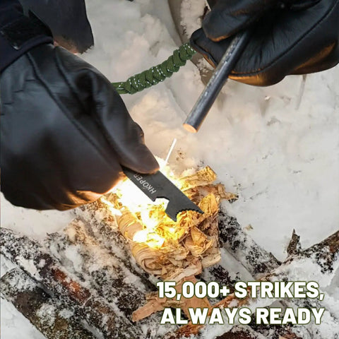 All In One Fire Starter Kit With A 4 Inch Ferro Rod For Camping And Hiking in use on snowy ground with gloves.
