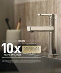 Moen faucet next to award plaque, 10 years in a row America's most trusted brand, modern kitchen setting