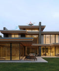 Top Tier Heavy Workhorse Roof Mount Whole House Fan For Flat Roofs With Zero Attic visible on modern house exterior.