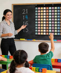 Teacher using Boho Hundred Pocket Chart With 100 Pockets And 150 Double Sided Number Cards Numbers 1 To 100 Classroom Organizer