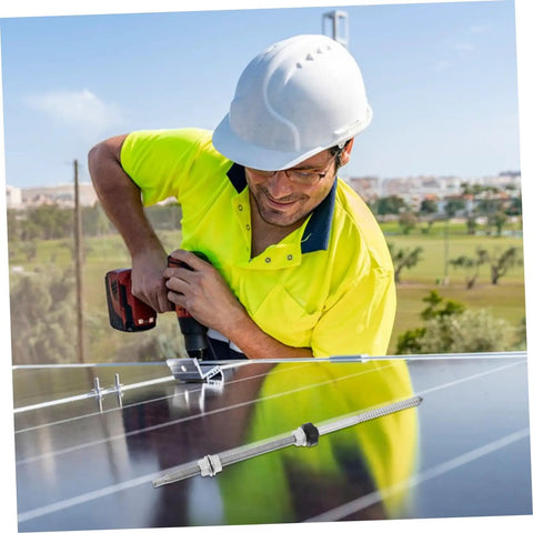 Person installing Beefy Stainless Steel Solar Panel Roof Mount Hanger Bolts on a solar panel for secure rooftop installation.