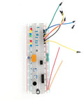 U Shape Breadboard Jumper Wires Kit With 560 Pieces Featuring 14 Length Options From 2mm To 125mm Solderless Flexible Connecting Cables Random Color Multi Pack For Prototyping And DIY Electronics Projects on a breadboard with components