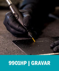 Gloved hand using 9901HP One Eighth Inch Cylinder Tungsten Carbide Beefy Performance Rotary Carving Bit Titanium Nitride Coated