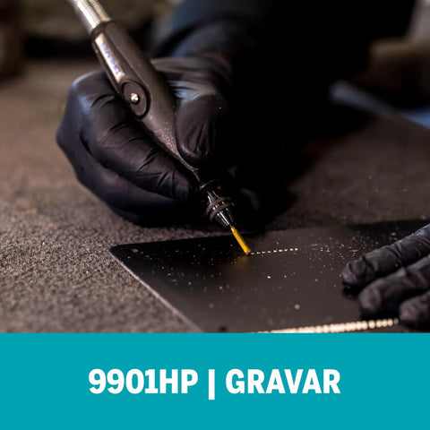Gloved hand using 9901HP One Eighth Inch Cylinder Tungsten Carbide Beefy Performance Rotary Carving Bit Titanium Nitride Coated
