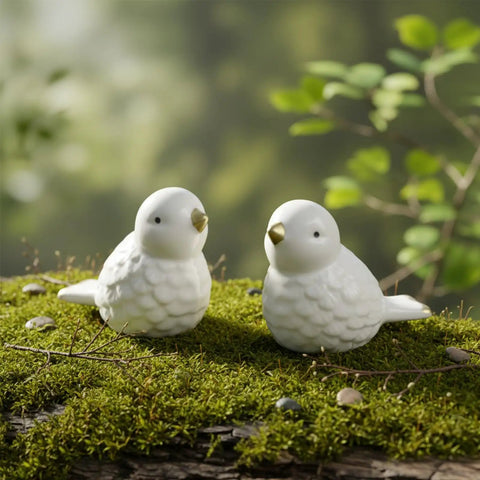 Duck Design Ceramic Toilet Bolt Covers 2 Pack Universal Fit Screw Caps To Totally Hide Rusty Flange Bolts Quick Snap Installs Zero Mess Decorative Hardware Upgrade For Fresh Bath Vibes on moss background with two white ceramic birds.