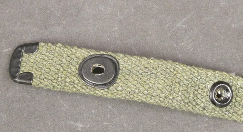 Close-up of M1 Carbine Web Sling OD Green One Inch Canvas Reproduction With Lift-The-Dot Closure WWII Style Steel Fixtures