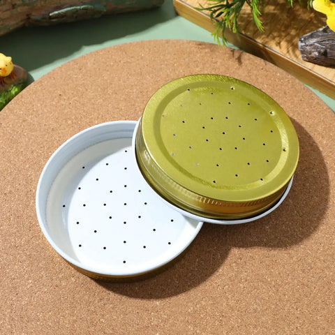 Metal Bee Feeders For Honeybee Hives Entrance Feeders mason jar lids shown on cork surface