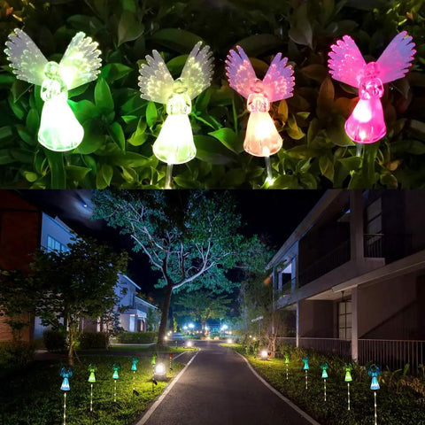 Solar Angel Lights Outdoor Decor Set Of 2 with fiber optic wings and color changing LED beads in a garden at night