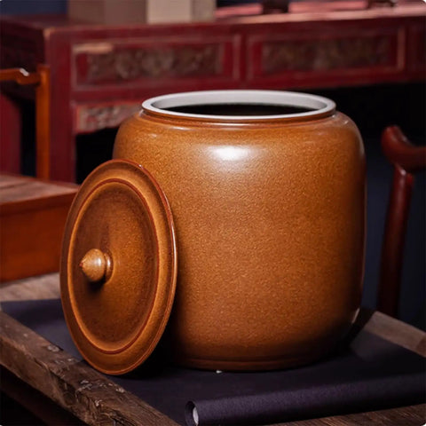 Hella Durable Ceramic Cereal And Rice Dispenser With Seamless Airtight Lid, large brown ceramic jar with lid.