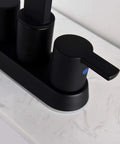 Close-up of the handle on a 4 Inch Matte Black Bathroom Sink Faucet With Sleek Modern Arc Design, Solid Brass Build, Easy Install, Durable Construction, And BF040-9-MB Model For A Dope Powder Room Upgrade, resting on a white countertop.