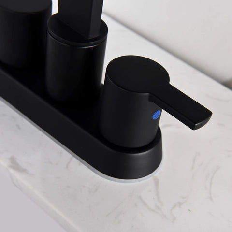 Close-up of the handle on a 4 Inch Matte Black Bathroom Sink Faucet With Sleek Modern Arc Design, Solid Brass Build, Easy Install, Durable Construction, And BF040-9-MB Model For A Dope Powder Room Upgrade, resting on a white countertop.