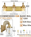 Three Light Sleek Brushed Nickel Vanity Fixture With Clear Glass Shades Over Mirror for modern bathroom lighting details.