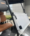 White 4 Seater Electric Golf Cart Featuring Flip Up Seats 48 Volt 150 Amp Hour Lithium Battery And Backup Camera, interior view of flip-up seats and mirror.