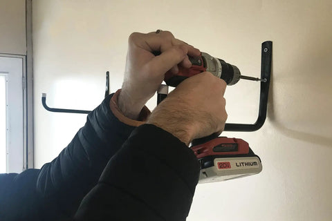 Installation of Heavy Duty Steel 10 Inch Garage Storage Utility Hooks 4 Pack Black Powder Coated Rust Resistant Wall Mount Hooks for Tools and Gear