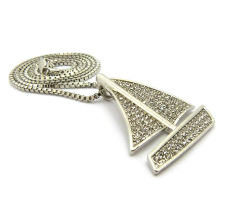 Angled view of the Iced Out Sailing Yacht Pendant Necklace With 24 Inch Chains In Silver Tone, imitation silver plated jewelry.