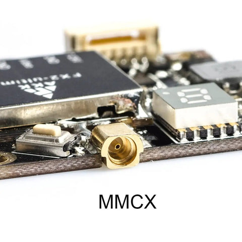 Close-up of 5.8GHz FPV VTX with MMCX support and Betaflight OSD config, showing connection points and components for racing drones.