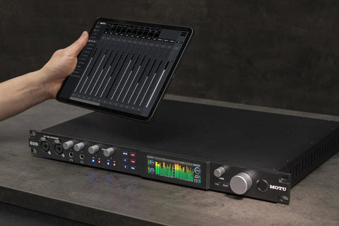 Next Gen 28x32 USB3 Audio Interface With 24 Bit RGB Display And Real Time Metering Pro Grade IO on studio desk with tablet control