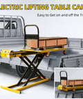 Heavy Duty Electric Scissor Lift Table Cart 47 Inch Height With 660 Lbs Capacity Portable Flatbed Hand Truck on truck bed.