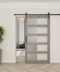 Built Tough Frosted Glass Barn Door 48 By 96 Inches With Heavy Duty Eight Foot Sliding Track Hardware Kit In Gray For Easy Slide Interior Room Divider displayed in a modern interior.