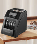Coin Sorter And Counter Machine For Pennies Nickels Dimes Quarters With LCD Display on desk with coins next to it.