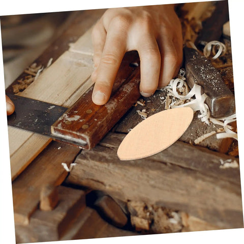 Quality Wood Biscuit Joiner Plates for Sturdy Furniture Assembly shown in use with a hand tool on wooden boards.