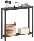 Slick Industrial Console Table For Tight Spaces, Hella Compact Two Tier Sofa Table With Open Storage Shelves, Matte Black Finish with decorative items.