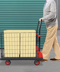 Heavy Duty Platform Cart With Cage And Foldable Flatbed Hand Truck Dolly For Moving Boxes And Equipment Built Like A Tank From Thick Steel And Durable PP Rust Resistant Scratch Proof No Warping Ready For Daily Tough Jobs, side view with box