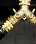 Garden Hose Adapter Set 3/4 Inch Brass GHT Double Female Swivel Connectors attached to a hose with brass fittings visible