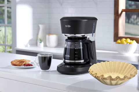 Natural Unbleached Brown Biodegradable Extra Large Coffee Filters For 10 To 15 Cup Baskets next to coffee maker on counter