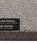 Close-up of skid resistant carpet stair tread showing low profile, 1/4 inch pile height with no fraying edges.