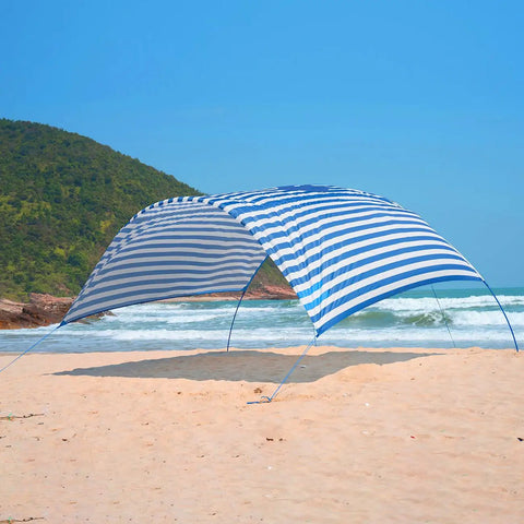 Wind-Powered Beach Shade Canopy No-Fuss Easy Setup Sun Shelter Tent with UPF 50+ UV Protection on sandy beach
